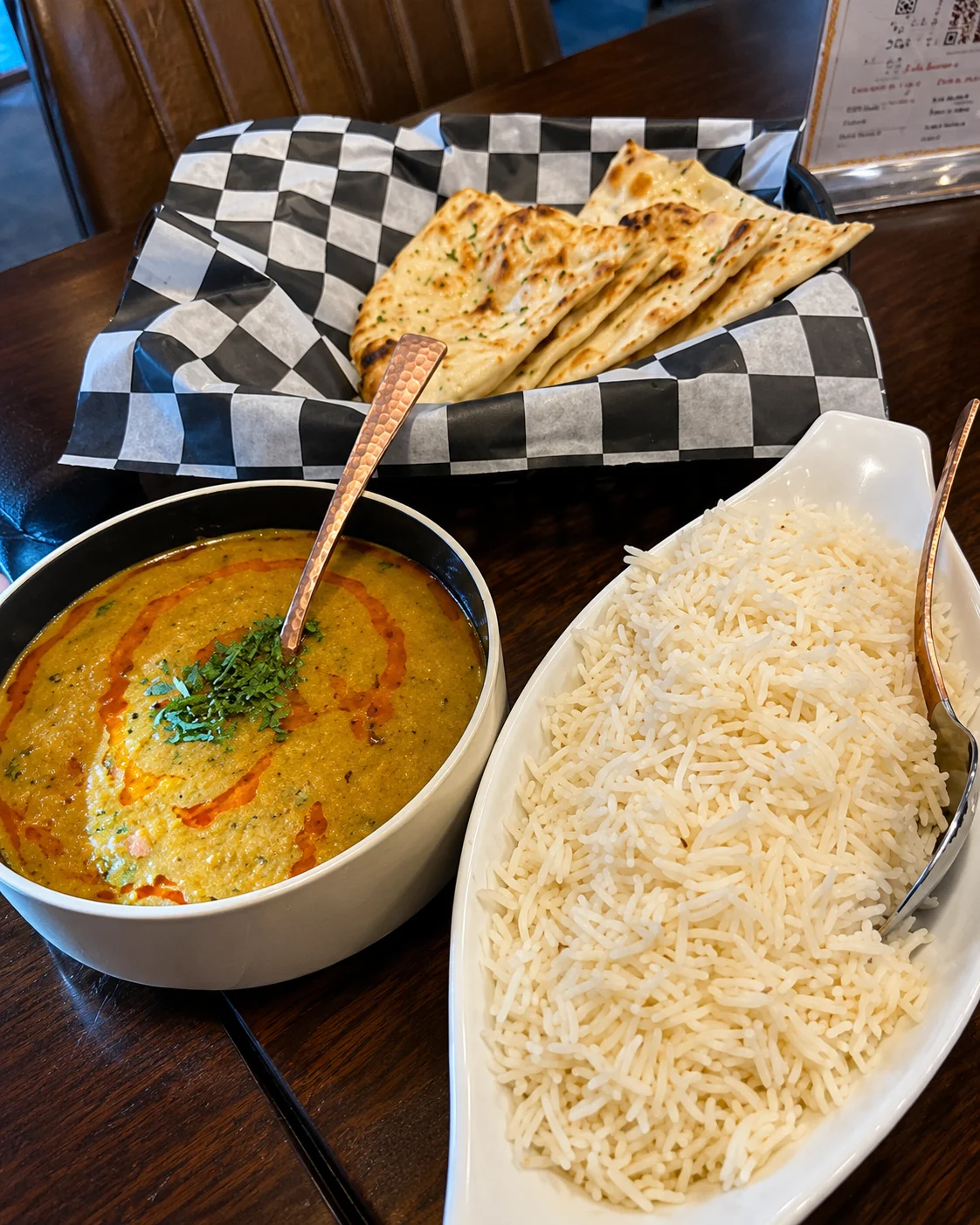 Dal Tadka Bowl — yellow lentils with Indian spices on masala rice at My Spice N Rice, Calgary (Vegan)